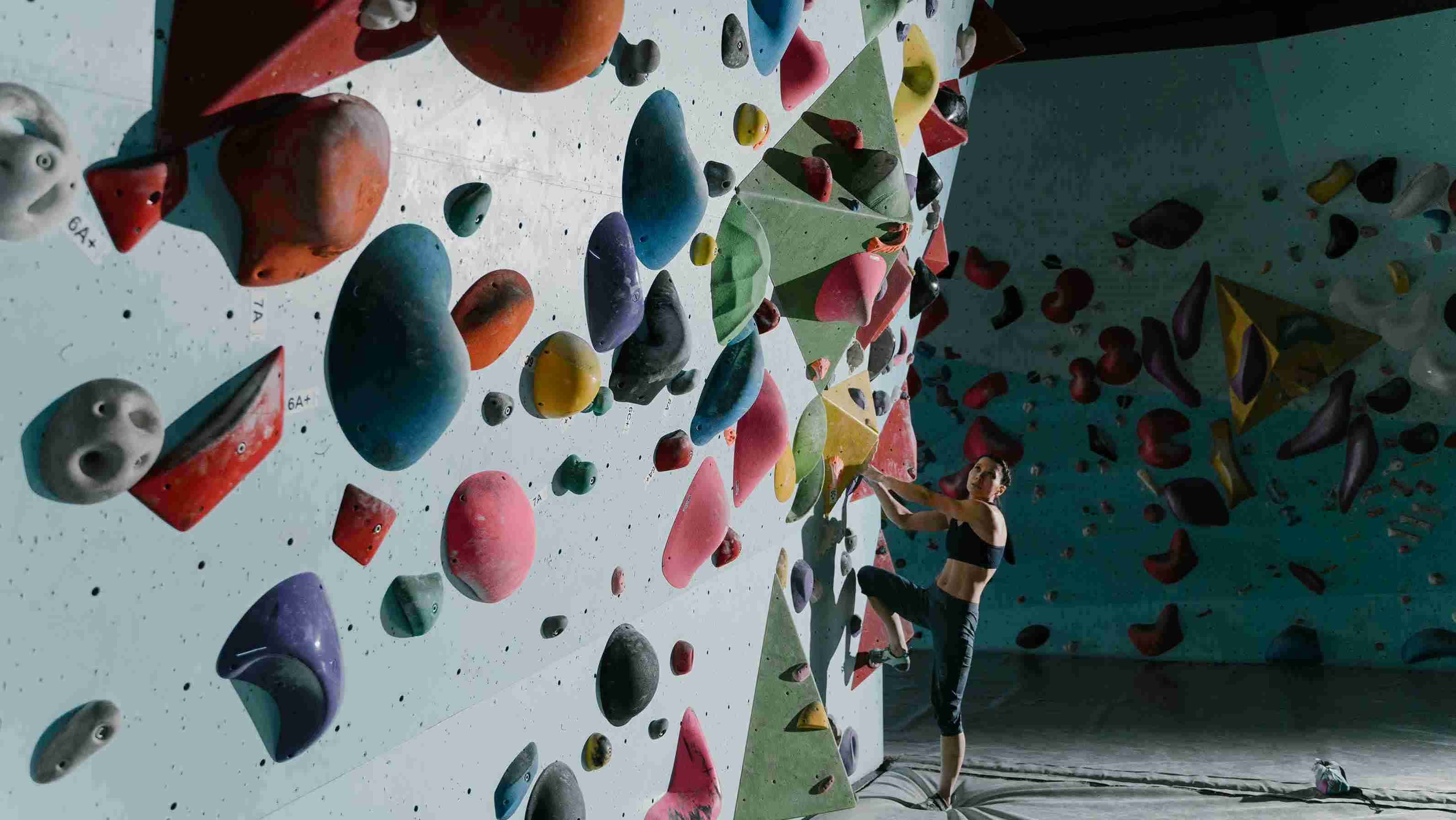 Woman wall climbing