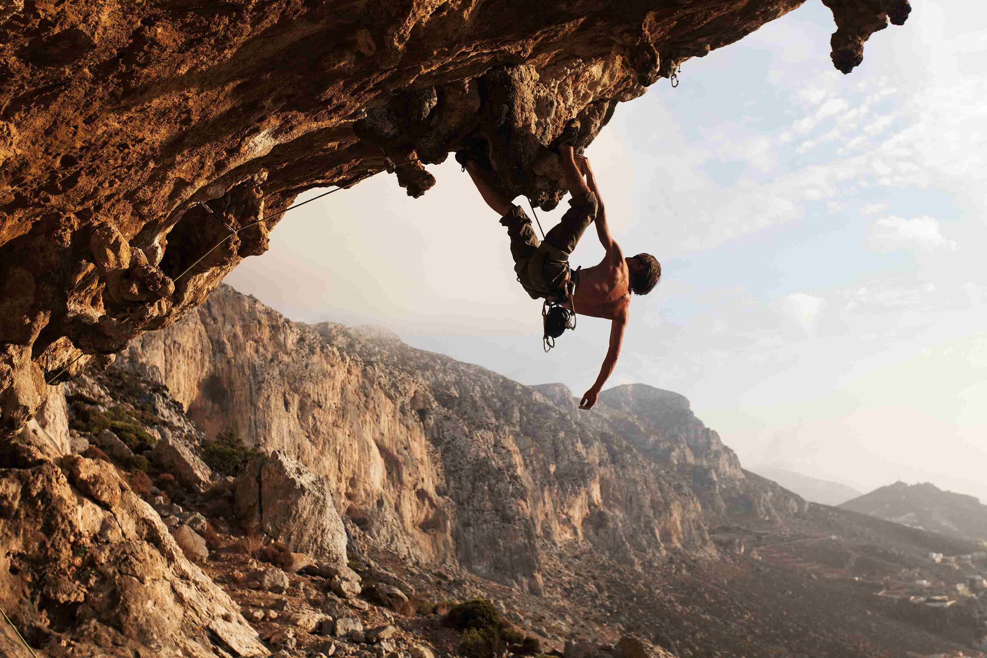 Man rock climbing outdoors