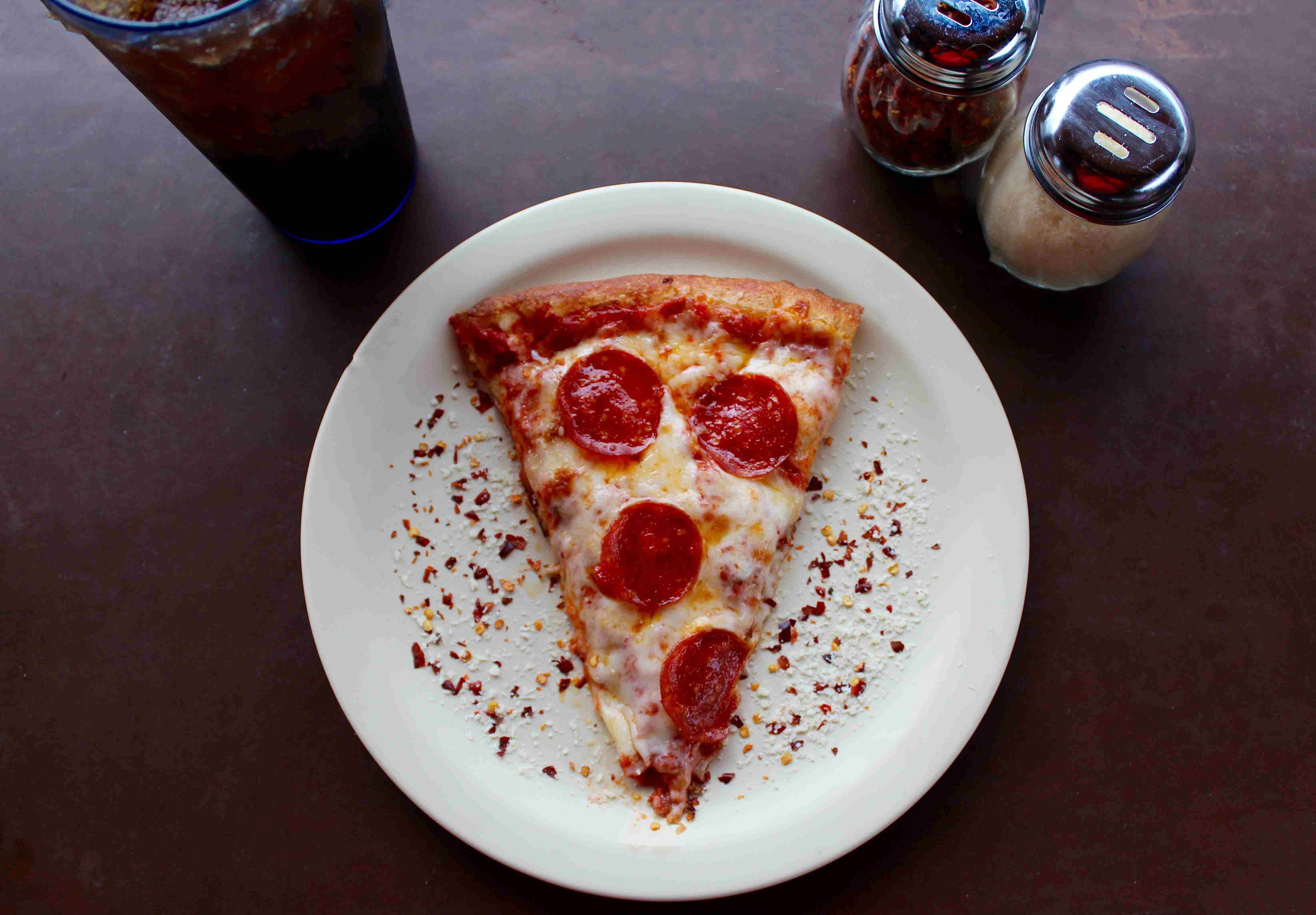 Pizza slice on a plate